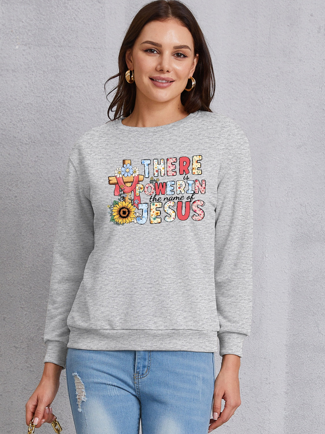 THERE IS POWER IN THE NAME OF JESUS Round Neck Sweatshirt